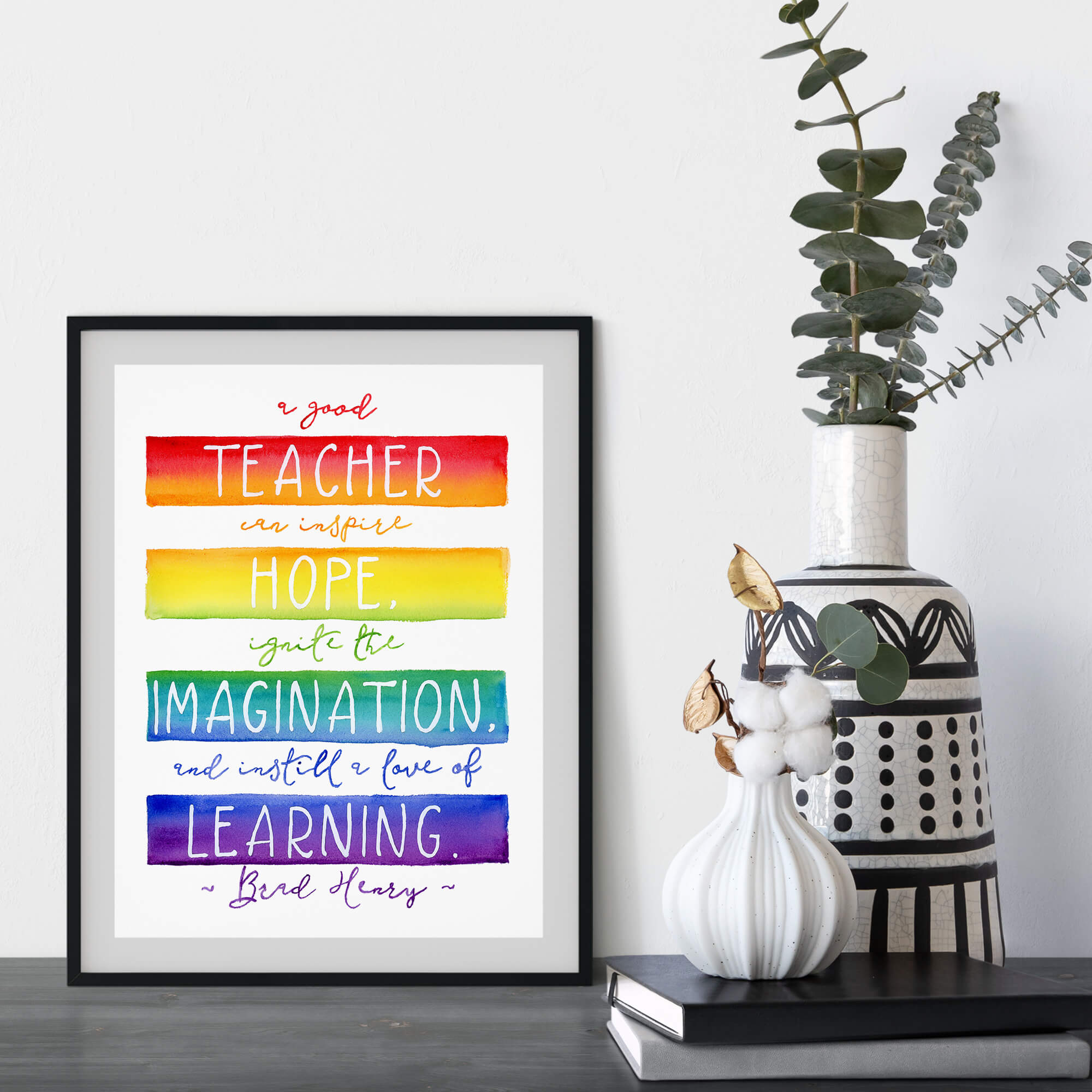 Watercolor "A Good Teacher Can" Quote Digital Download Mock Up in Room with Grey Walls with Books and Vase